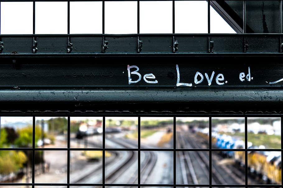 Be Love on black steel fence, bridge, track, train, script HD wallpaper