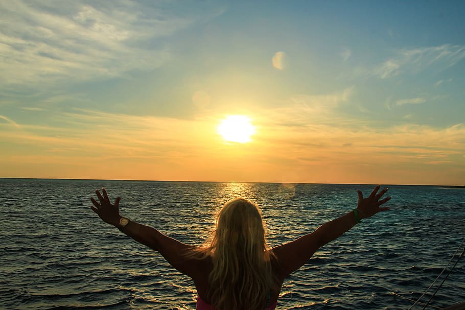 woman raising hands facing ocean, sunset, maldives, sea, water HD wallpaper