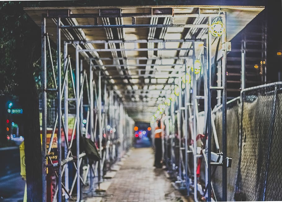 pathway with truss, light, city, night, sidewalk, scaffolding HD wallpaper