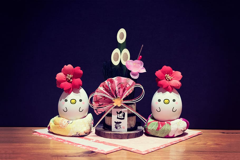 two chicken-painted  eggs with flowers and kanji script accessory decor HD wallpaper