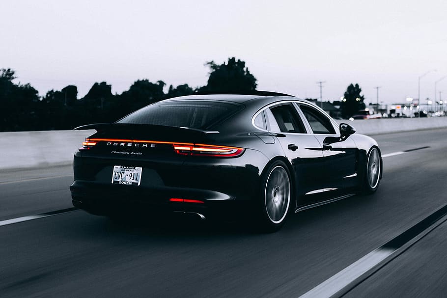 running black Porsche sedan, grayscale photo of Porsche sedan on gray road, HD wallpaper