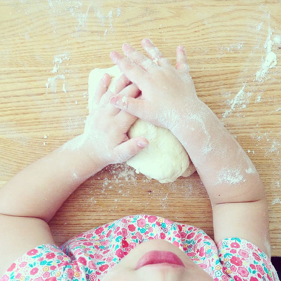 person hand holding dough on brown wooden board, girl, floral HD wallpaper