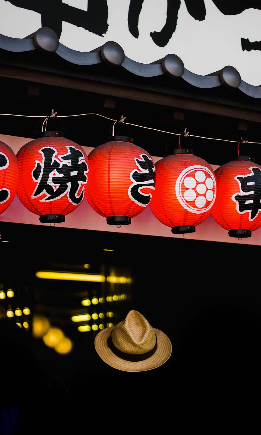 brown hat under lantern lamps, brown straw hat fedora hat hovering below chinese lantern HD wallpaper