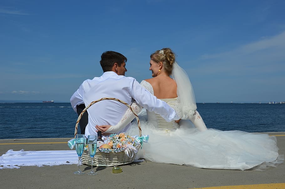 woman wearing white wedding gown and man wearing white dress shirt HD wallpaper