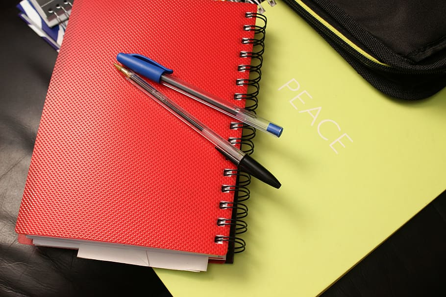 blue and black ballpoint pens on top of red notebook, school HD wallpaper