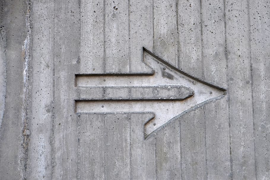 gray arrow left sign, arrow engraved on brown wooden surface HD wallpaper