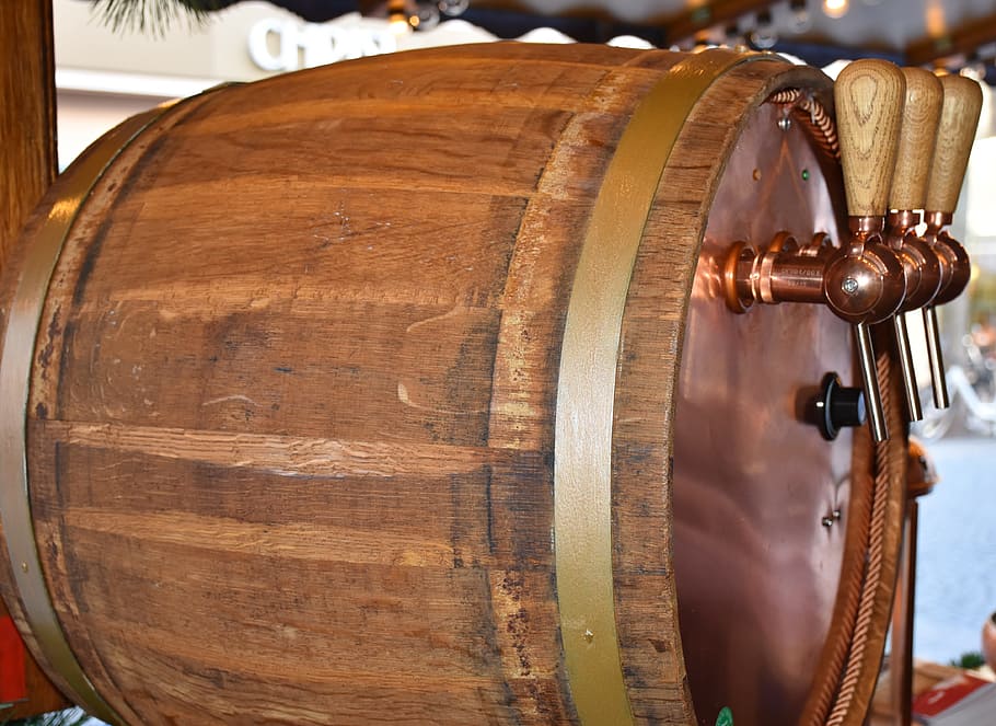 brown beer barrel with beverage dispenser on wooden surface HD wallpaper