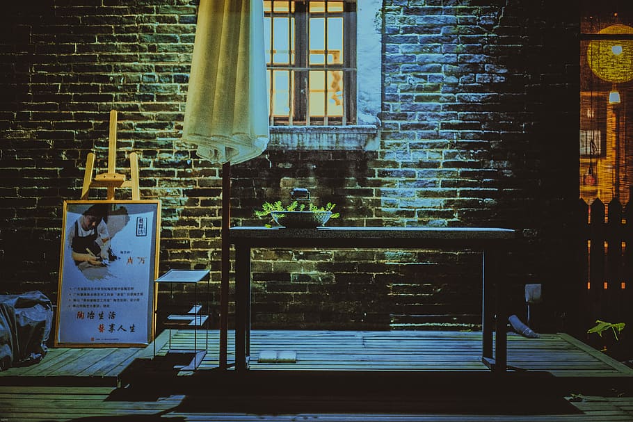 green plant on table near window, rectangular gray wooden console table beside white parasol HD wallpaper