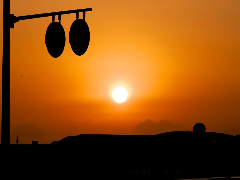 silhouette photo of round metal frame during golden hour, sunset HD wallpaper