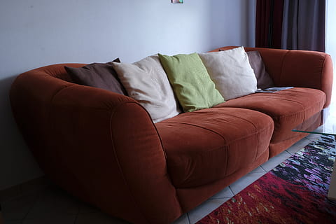orange fabric two-seat sofa, couch, rest, cozy, furniture, pillow HD wallpaper