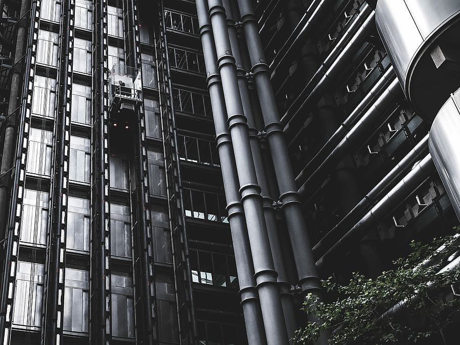 grayscale photography of building with elevator, worm's eye view of building HD wallpaper