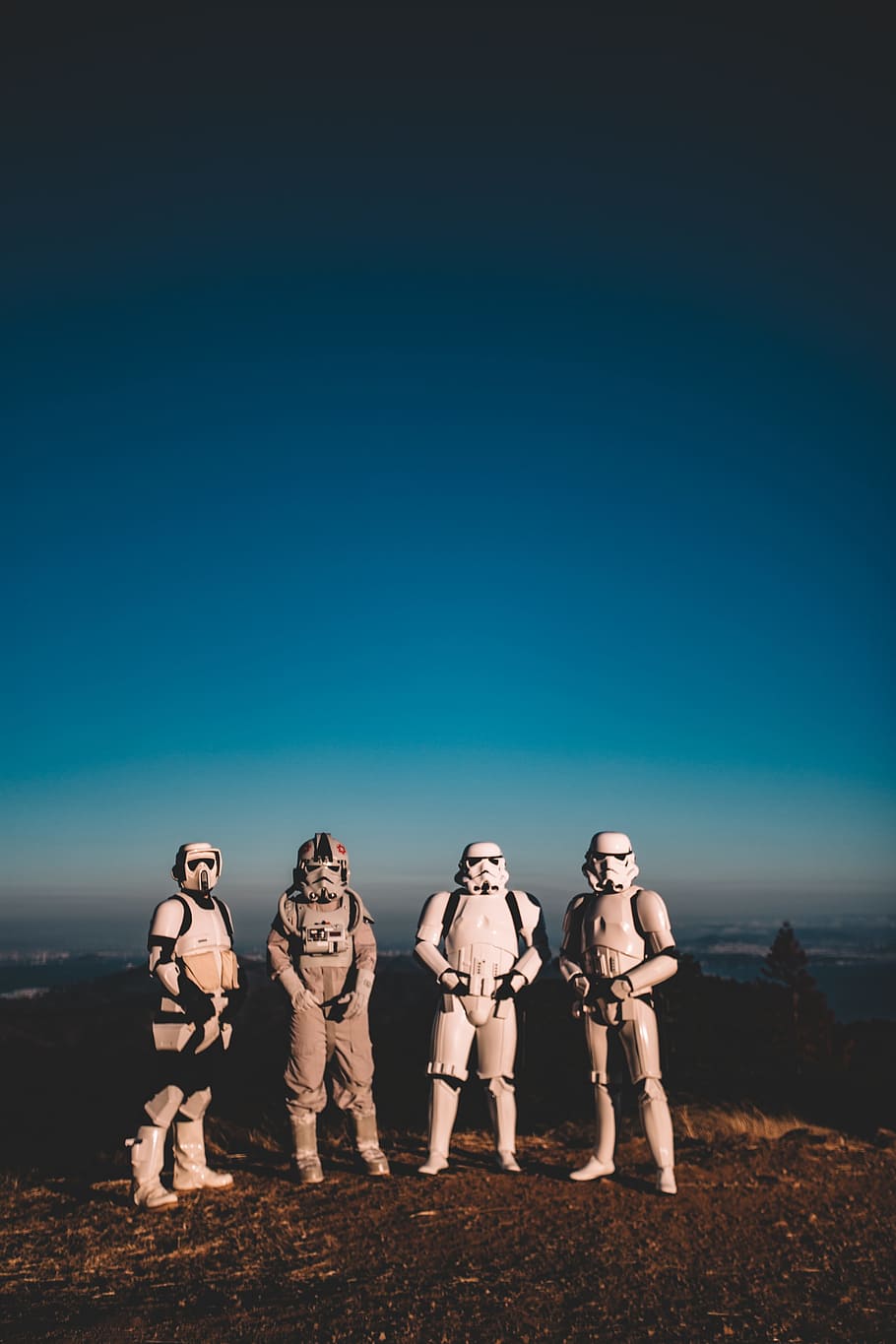 four person wearing Star Wars Clone Trooper costumes, four men wearing Star Wars Stormtrooper costumes standing in front of mountain, HD wallpaper