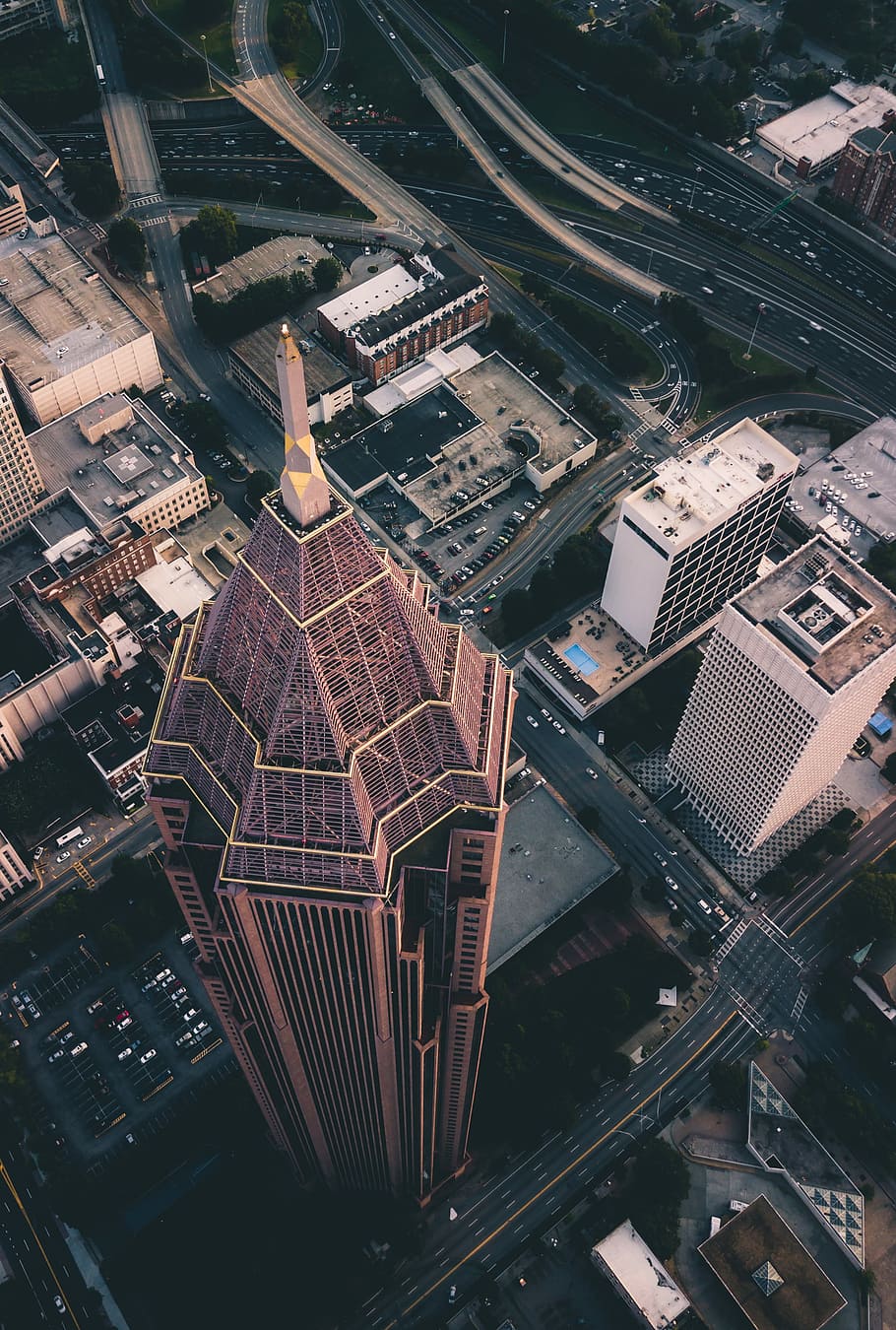 high-angle photography of high-rise building and concrete road, bird's eye photography of tower