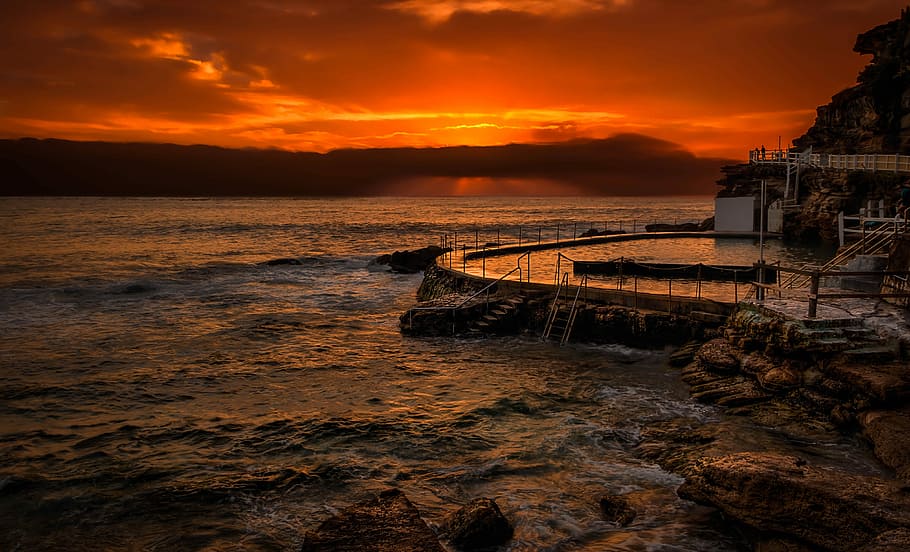 swimming pool near to body of water, untitled, sunset, ocean HD wallpaper