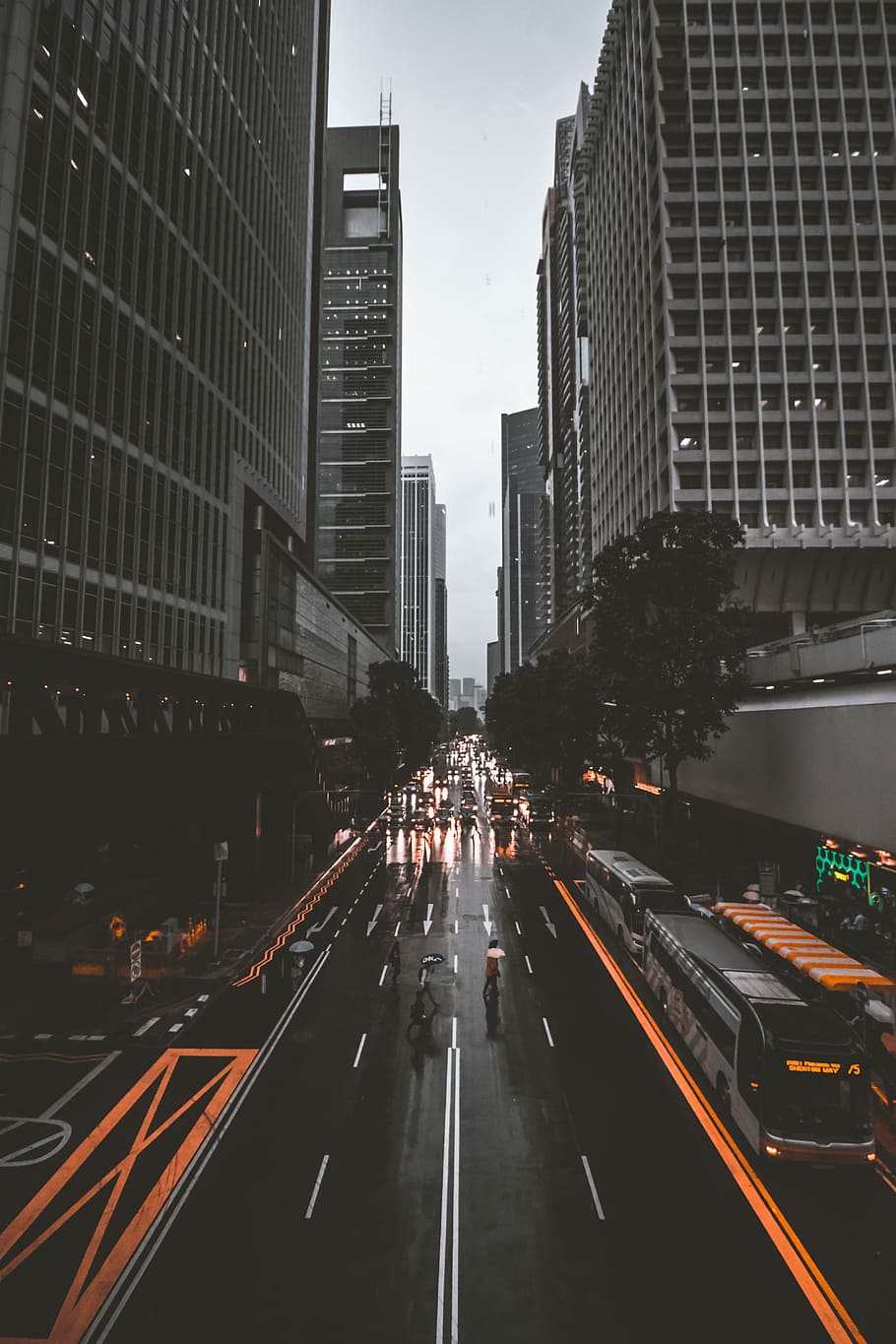 people crossing road between high-rise buildings, time lapse photography of bus on road near white buildings HD wallpaper