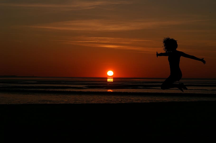 woman taking jump shot at beach during dusk, sunrise, women's, HD wallpaper