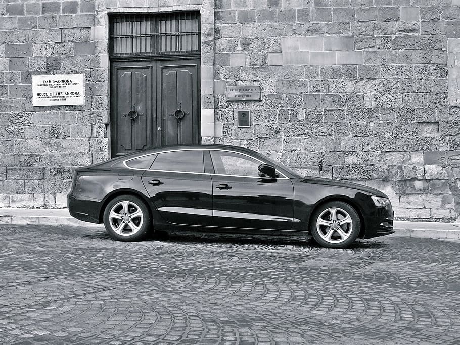grayscale photography of black sedan, luxury car, luxury cars