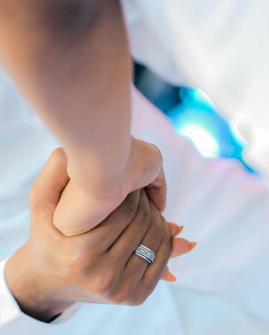 person holding each other's hands, man and woman holding hands HD wallpaper