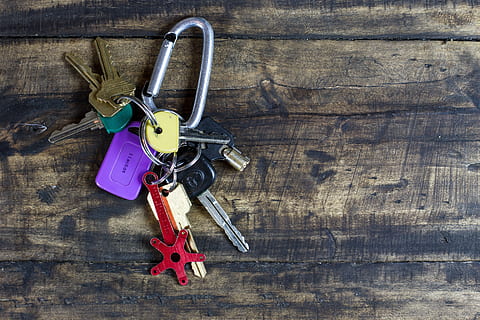 key chain on brown wooden surface, keys, lock, security, home HD wallpaper