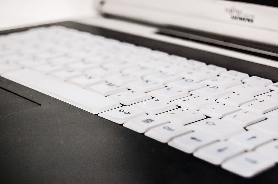 closeup photo of white and black laptop computer, keyboard HD wallpaper