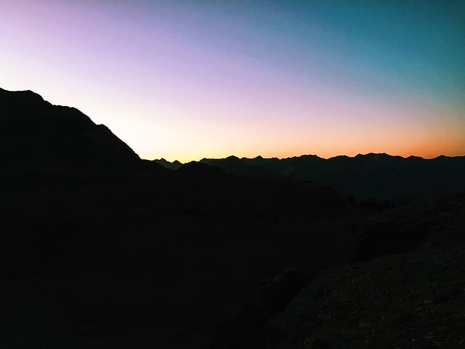 silhouette photo of mountain, silhouette of mountain during sunset HD wallpaper