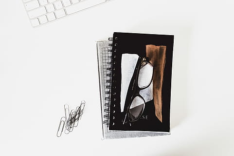 eyeglasses with black frames on book, black framed eyeglasses on book HD wallpaper