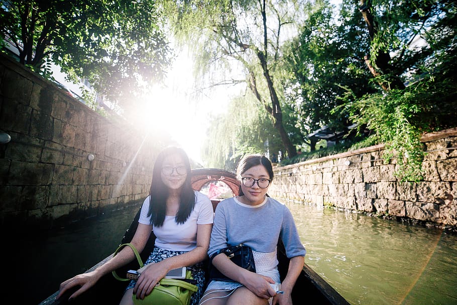 sisters, boat, backlighting, sitting, togetherness, two people HD wallpaper