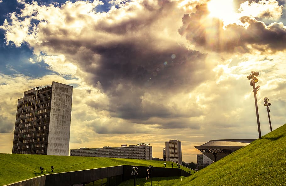 buildings, clouds, cloudy, grass, sky, cityscape, architecture HD wallpaper