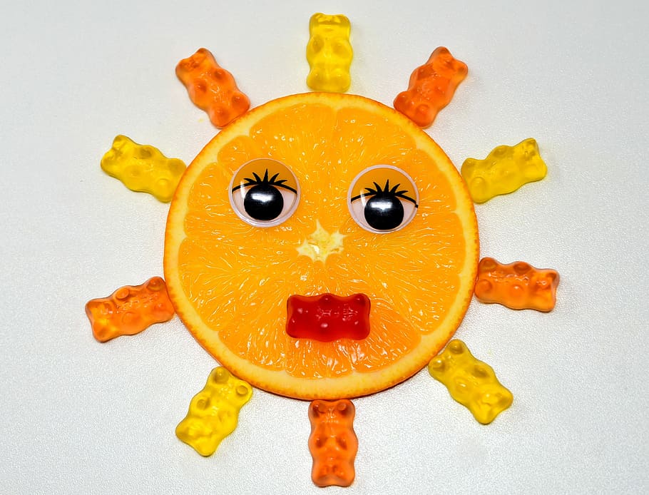 sliced orange, disc, sun, face, gummibärchen, delicious, funny HD wallpaper