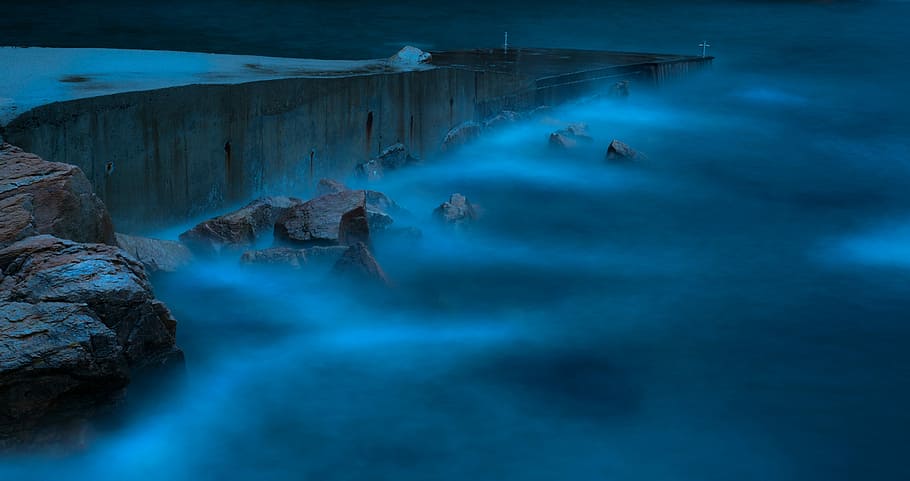 Nighttime by the sea, cliff covered by fog during nighttime, nature HD wallpaper