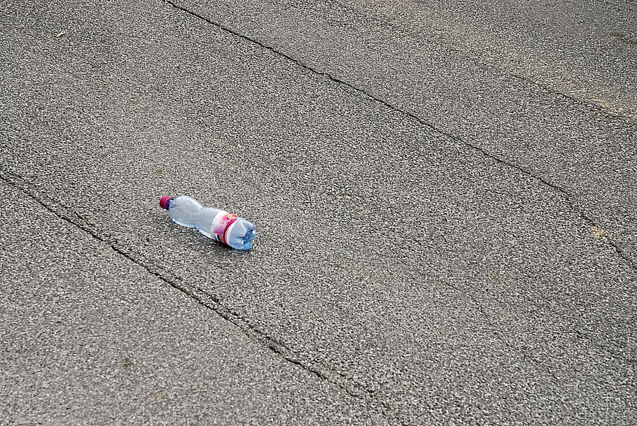 road, asphalt, bottle, plastic, cracks, street, high angle view HD wallpaper