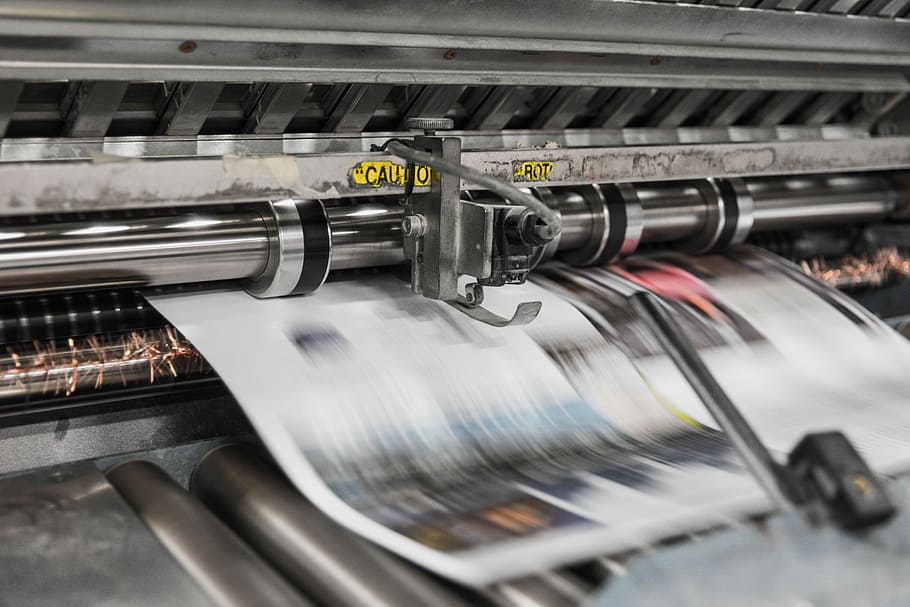 printing machine, closeup of newspaper printer machine, equipment
