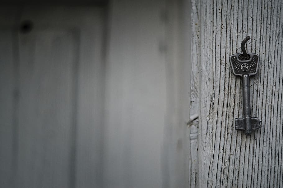 close-up photography of gray metal key on hook, blur, close up HD wallpaper