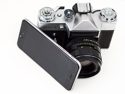 gray Zenit-E camera beside black smartphone, iphone, ios, iphoto HD wallpaper