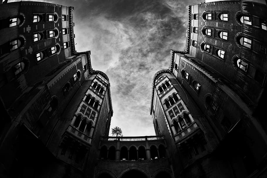 low angle photography of building, grayscale low-angle photo of concrete building under cloudy skies HD wallpaper