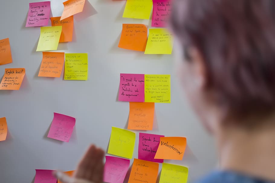 assorted-color sticky notes on white wall, feedback, analytics