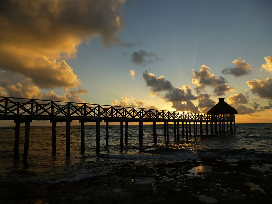 sunset, beach, sky, sea, water, cloud - sky, built structure HD wallpaper