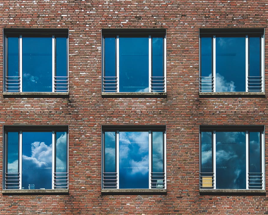 scenery of brown building, photo of brown painting high-rise building HD wallpaper