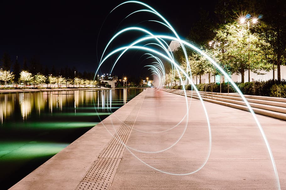 gray pavement beside body of water at night time, gray concrete road HD wallpaper