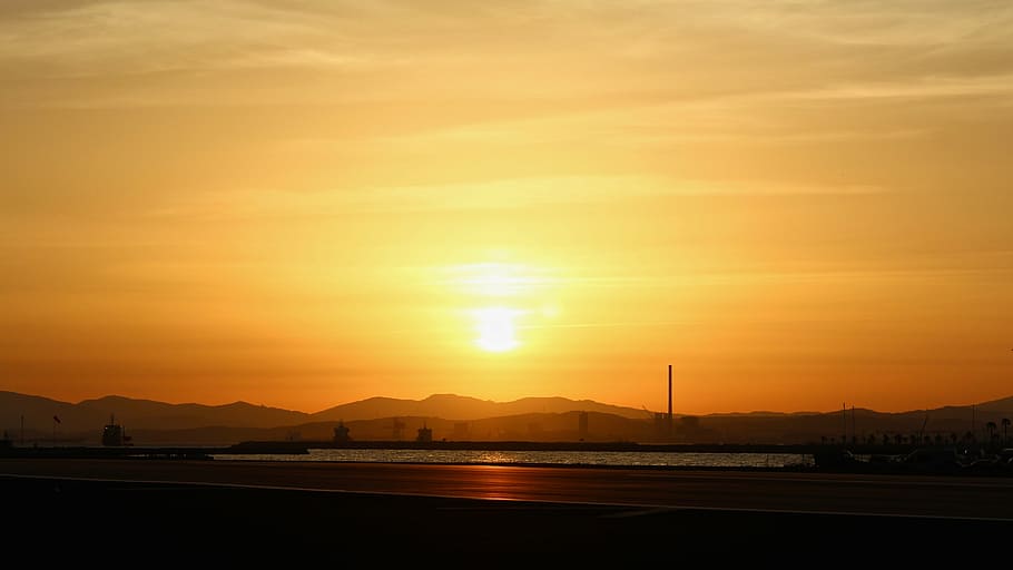landscape photography of body of water during golden hour, silhouette HD wallpaper