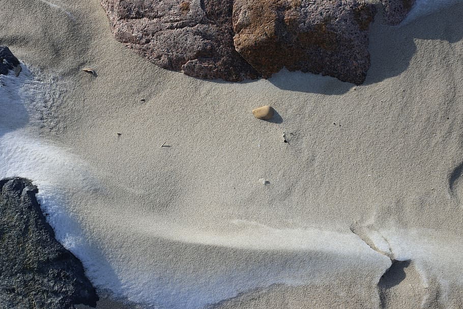 gray sand, gray sand near brown rock formation, beach, blank space HD wallpaper