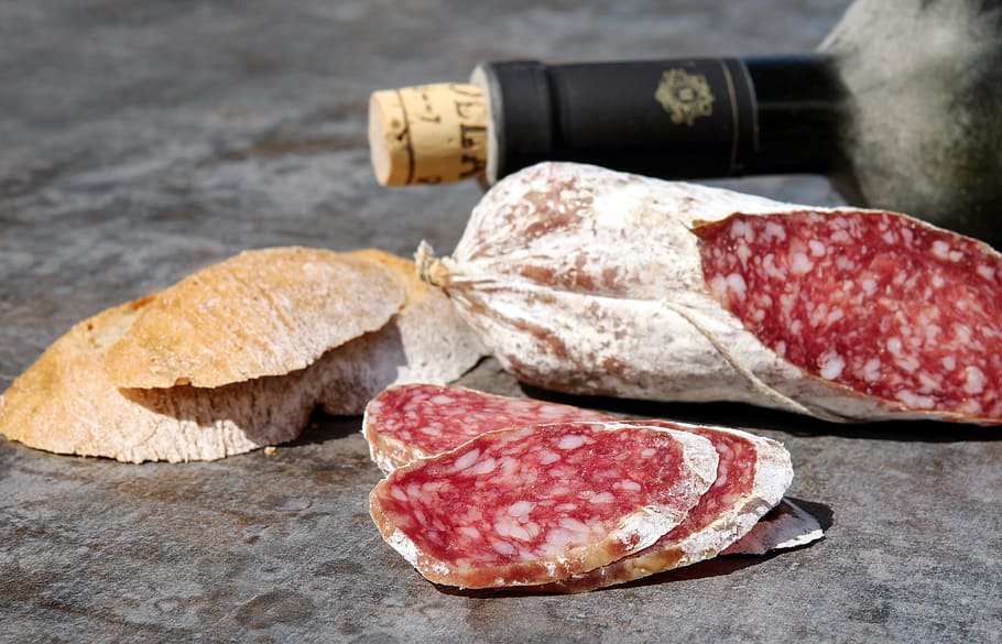 bottle beside sliced fruits, salami, sausage, cut, substantial HD wallpaper