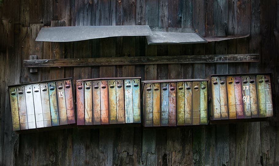 four multicolored steel racks, mailboxes, vintage, rusty, post HD wallpaper