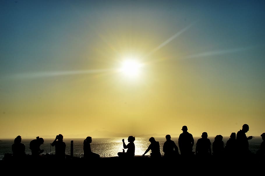silhouette photo of people gathering during golden hour, sunset HD wallpaper
