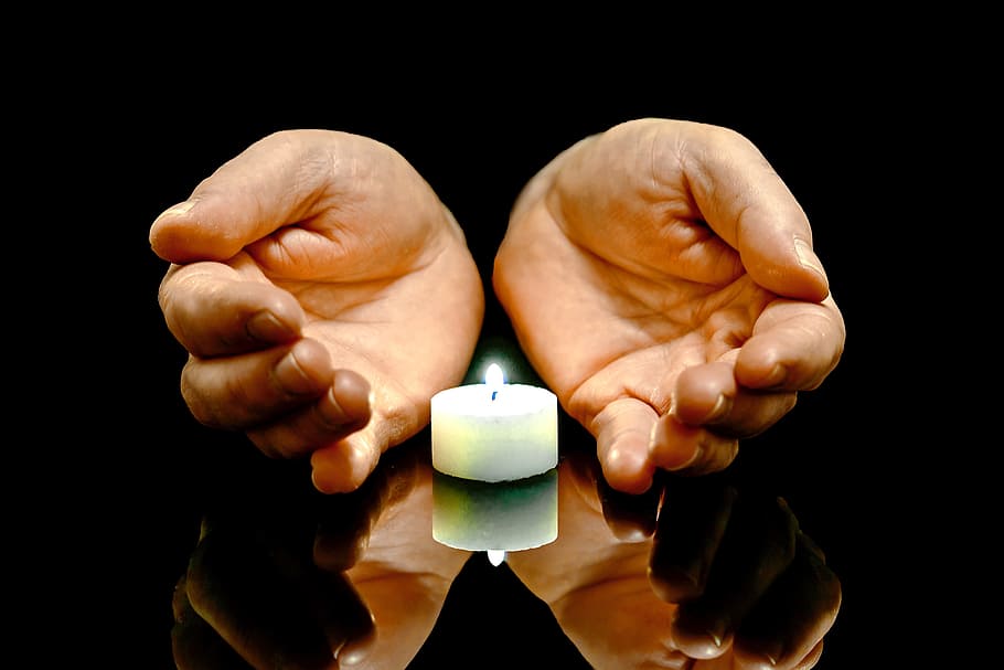 person hand near white candle, hands, protective hands, light HD wallpaper