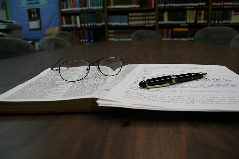 black pen beside eyeglasses on top of book, framed, reading, paper, HD wallpaper