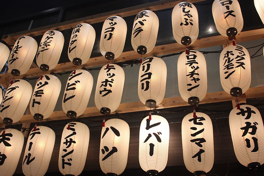 white-and-black calligraphy painted paper lanterns hanged on ceiling HD wallpaper