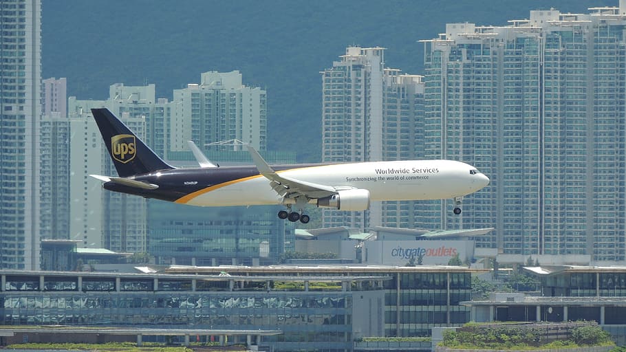 bird's eye view of airline about to land, hongkong, airplane