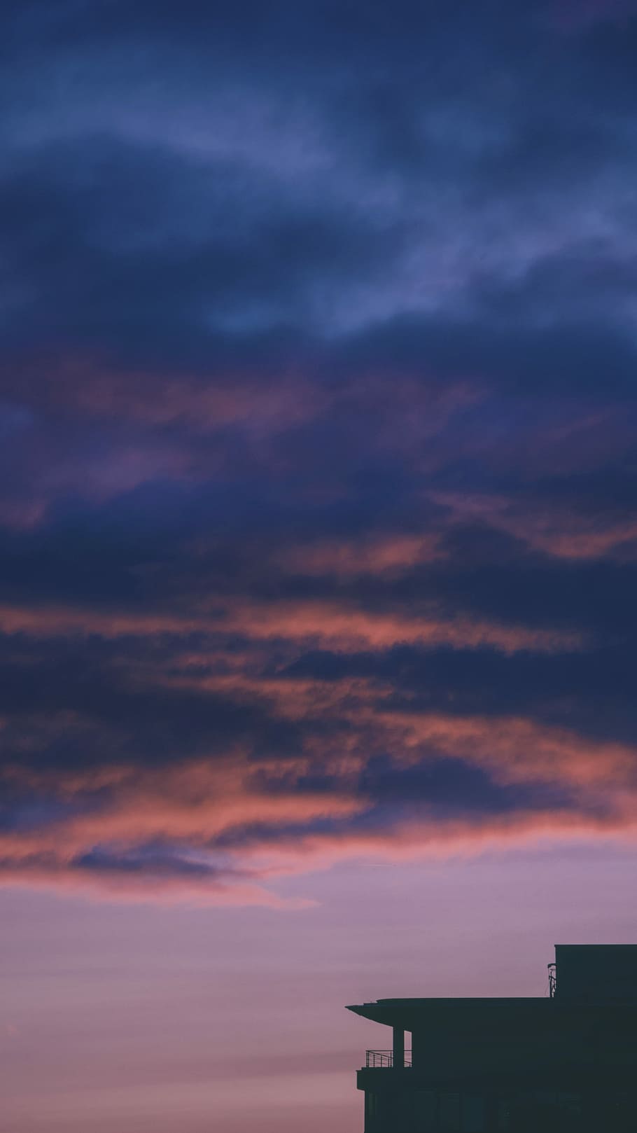 silhouette of building during golden hour, cumulunimbus clouds HD wallpaper
