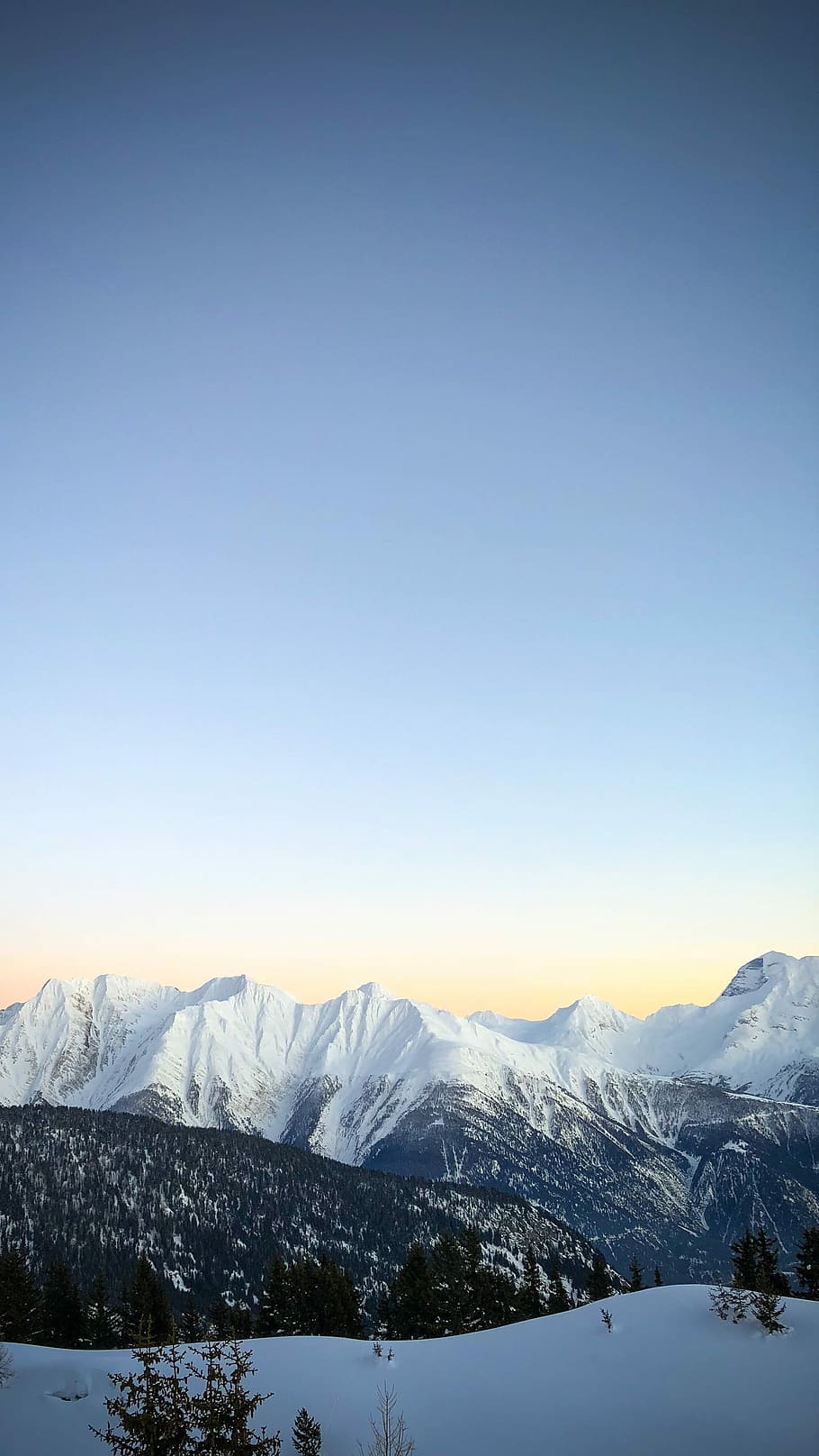 mountain covered by snow, mountains covered with snow under blue sky during daytime HD wallpaper